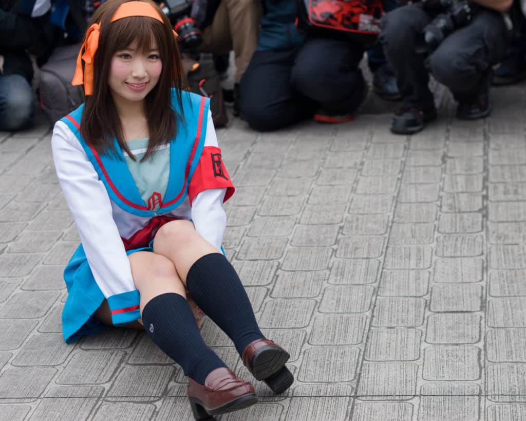 The sassy Haruhi Suzumiya, one of our easy cosplay ideas for girls. Considered one of the most memorable characters in the 2000s! Photo taken by kxz Chen [CC BY-SA 2.0 (https://creativecommons.org/licenses/by-sa/2.0)].